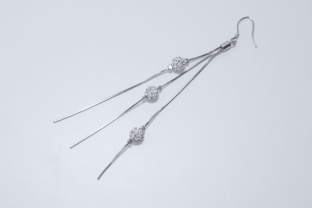 Tyche - Silver Zirconia Studded Tassle Dangler Earrings