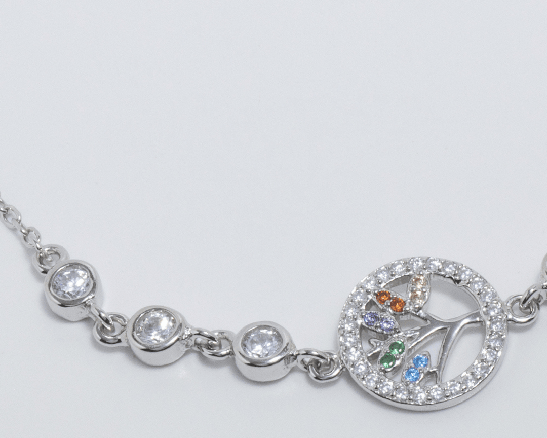 Eleos - Zirconia Solitaire World Tree Charm Bracelet