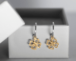 Load image into Gallery viewer, Fortuna - Dangling Floral Charm Earrings: Silver and Gold Polish
