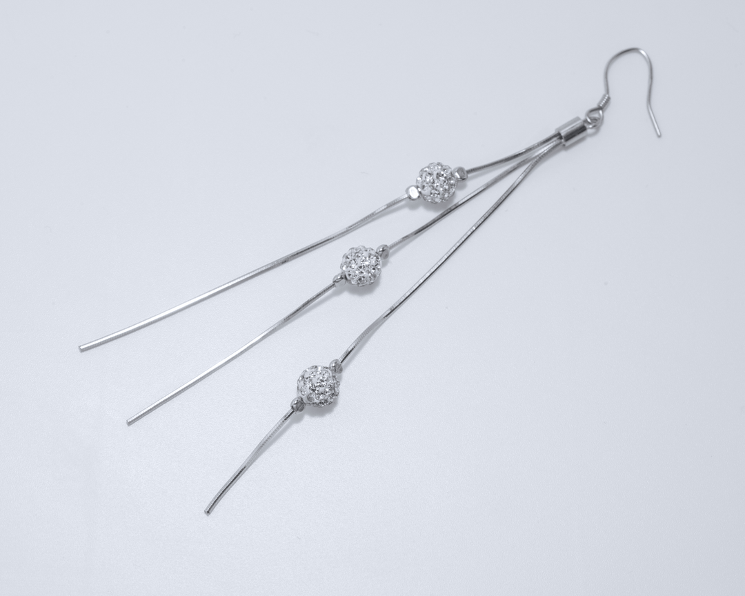 Tyche - Silver Zirconia Studded Tassle Dangler Earrings